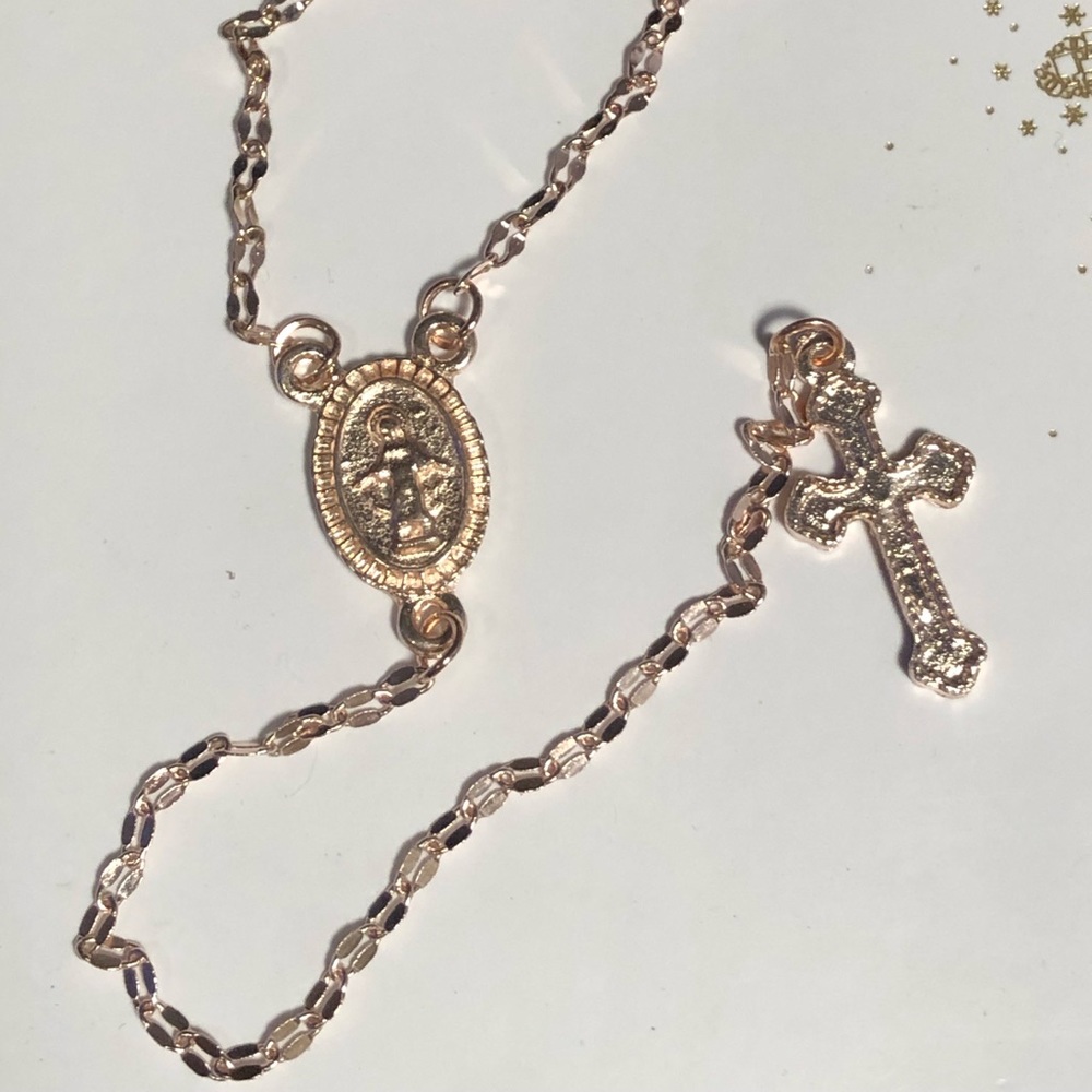 NWT Rosetone Gold Religious Necklace on a beautiful chain.